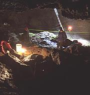 Inside the Qagnax cave during the 2003 excavation.