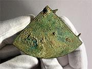 That's not junk: this is only the 8th astrolabe quadrant ever found.