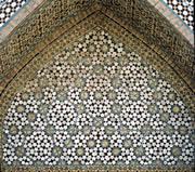 The pattern on the Darb-i Imam shrine, built in 1453, is almost identical to Penrose tilings, discovered in 1973.  Click here for a larger image