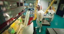 Suited up: extensive precautionary measures have to be followed in biosafety level-4 labs.