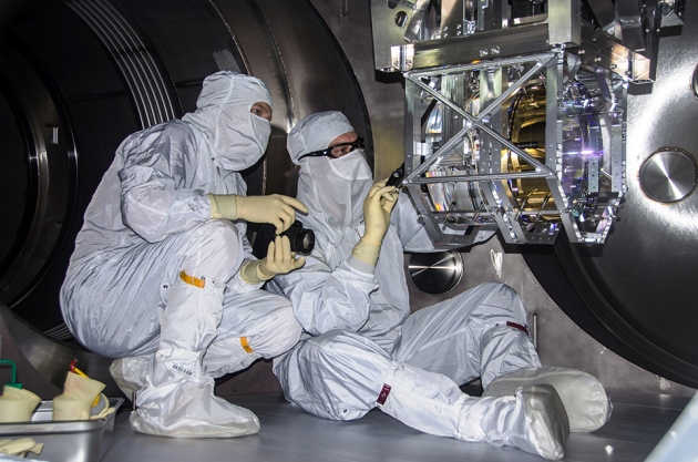 Researchers work on the LIGO observatory's detector in Livingston, Louisiana, in 2014.