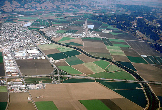Aerial view of Watsonville, CA and the agricultural areas surrounding the town