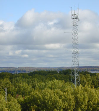 Meteorological towers like this one located in a temperate forest are distributed across ecosystems in all continents except Antarctica, providing assessments of carbon uptake by forest, grassland, desert, and crop ecosystems.