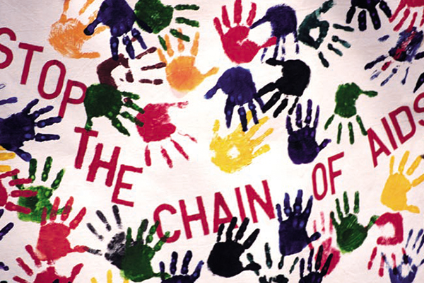 Hand prints saying Stop the chain of AIDS