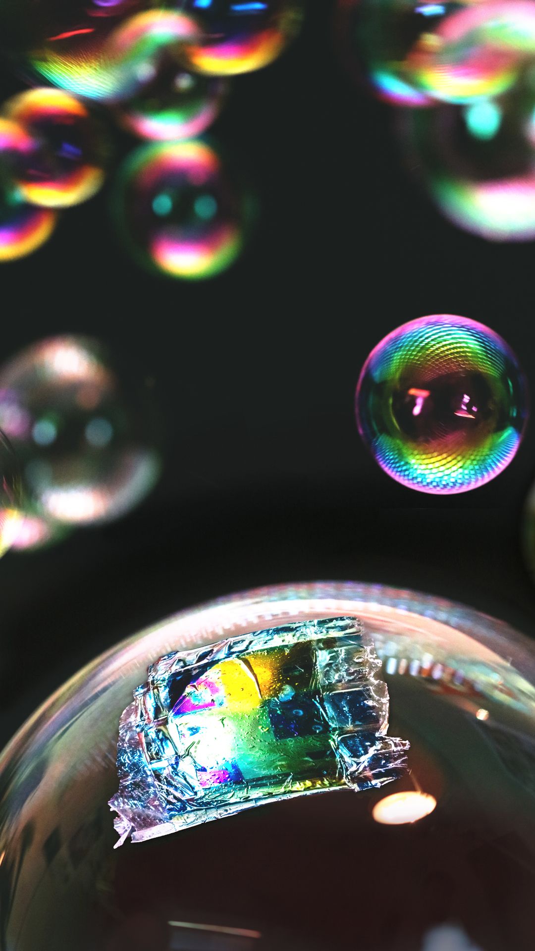 Fully printed ultrathin solar cell is light and flexible enough to rest on the surface of a soap bubble.