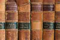Close-up of leather-bound vintage encyclopaedias.