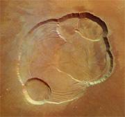 The caldera at the top of Olympus Mons is three kilometres deep, and could provide some of the finest mountaineering in the Solar System.