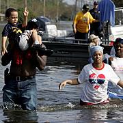 Police are helping flood victims to evacuate the city.