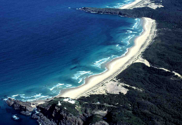 Well-developed intermediate beach containing transverse bars and rip channels along Lighthouse Beach, Australia.